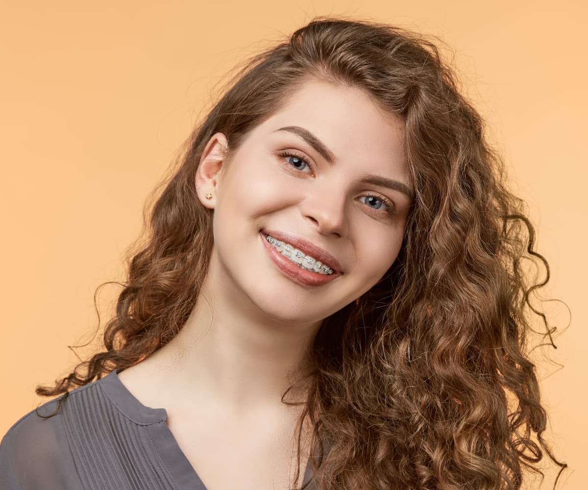 woman wearing metal braces